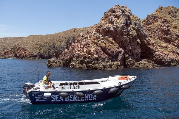 Tourist boat beside the rocks of Berlenga Grande